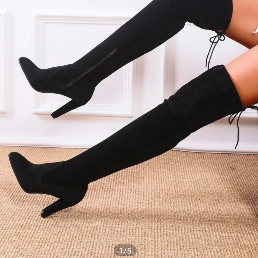 Thigh high black boots